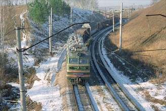 Krasnoyarsk region, russia, a freight train runs on the trans-siberian railway, october 1997.