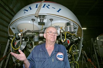 Murmansk, russia, july 23, 2007, anatoly sagalevitch, head of the mir program, pictured against mir-1 submersible, which is going to be used by russian explorers on a mission to probe the polar seabed...