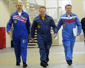 Moscow region, russia, september 18, 2008, u,s, space tourist richard garriott, astronauts michael fincke of the u,s and yury lonchakov of russia (l-r) appear prior to the examinational training at a ...