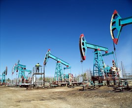 A cluster of oil wells, tomsk region, russia, september 1, 2003.