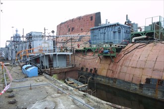 A decommissioned russian nuclear submarine at the primary stage of scrapping at the severodvinsk enterprise 'zvezdochka' in the frame of the intergovernmental russia-usa agreement signed in 1991 accor...