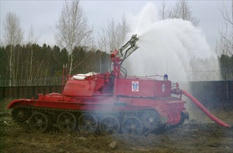 Moscow region, russia, november 21 2002: remote controled tank for fighting fires (in pic) was shown today at the demonstration exercises for the top officials of the territorial divisions of the emer...