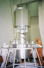 baikanur, kazakhstan, december 15 2002: model of a us space apparatus is prepared for the launch (in pic), together with five foreign satellites it is to be launched into orbit by a conversion missile...