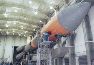 Arkhangelsk region, russia, march 31, 2003, a molniya-m space rocket pictured at the assembly and test complex of plesetsk cosmodrome, as preparations for the launch of the rocket have been completed ...