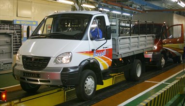 gaz-3310 'valdai' medium-duty truck leaves the conveyor belt area in a shop of the gaz (gorky) automobile plant, nizhni novgorod, russia, 2004.