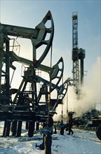 Oil field of the tyumen oil company in the mansiysk region, siberia, 2000.