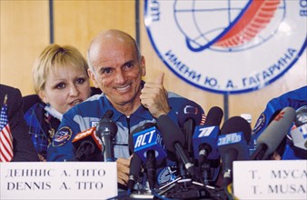 Billionaire space tourist dennis tito at a press conference in zvyozdny gorodok (star town) after spending 8 days aboard the international space station, moscow region, russia, may 2001.