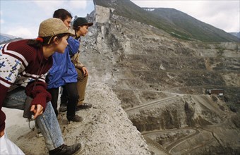 Student hikers watching the mining of apatite at the kirov mine on the kola peninsula in the murmansk region of russia.