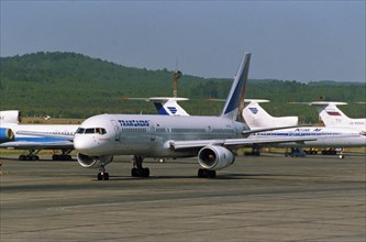 A transaero boeing 737 on the tarmac at krasnoyarsk airport in siberia, 1990s.