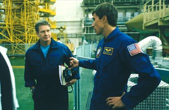 International space station, baikonur space center, 10/99: first iss crew member sergei krikalev (right) and us astronaut bill shephard.