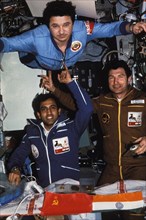 Salyut 7, soyuz t-10, soyuz t-11, leonid kizim (top), sharma, and yu, malyshev aboard the space station, 1984.