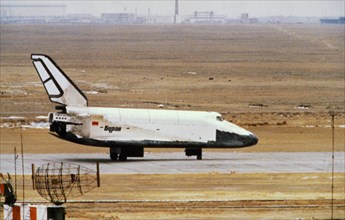 Soviet space shuttle buran after landing at the yubileiniy airfeild at baikonur in kazakhstan, ussr after an unmanned test flight, november 1988.