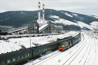 A train at the severo-baikalsk (northern baikal) railway station along  the baikal-amur mainline (bam) railroad (northern extension of the trans-siberian railroad) in the buryat region of russia.
