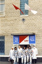 Soyuz tm-11 crew toyohiro akiyama (japan), viktor afanasyev, and musa manarov prior to launch, 1990.