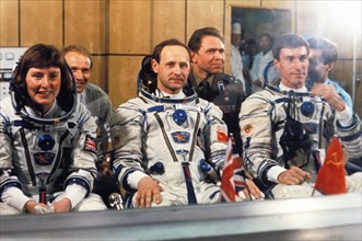 Soyuz tm-12, cosmonauts helen sharman (uk), anatoly artsebarsky, and sergei krikalev prior to launch, 1991.