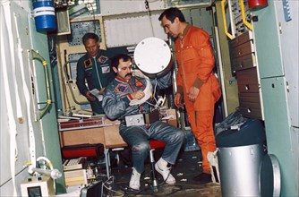 Mir, soyuz tm-18, valery polyakov, yuri usachyov, and afanasyev  training aboard a mock-up of the mir space station, 1994.