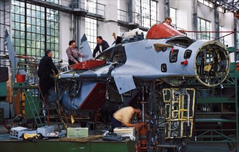 A mig-29 jet fighter plane being built at the moscow aviation association, russia.