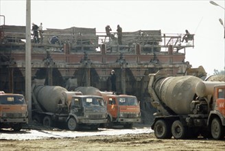 Chernobyl aps, ukraine, ussr, cement mixers loading up to deliver cement to the site of the accident, june 1986.
