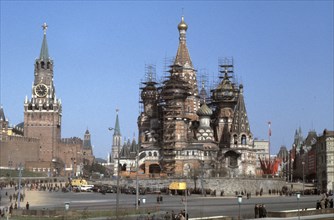 St, basil's cathedral under renovation in red square with the moscow kremlin on the left, 1980s.