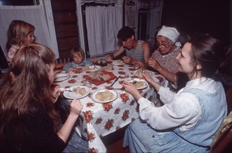 Russian (slav) family eating dinner, russia, 1990s.