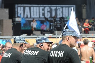 Tver region, russia, july 12, 2009, riot police officers seen at the concert at nashestvie-2009 rock festival in tver region.