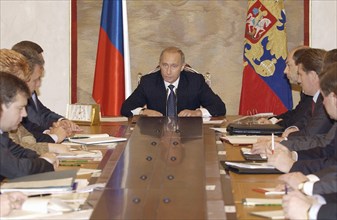 President vladimir putin (c)has said at the monday's meeting with the russian government that he will not meet representatives of the business community to discuss the situation with yukos, october 27...
