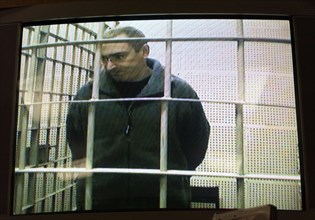Moscow, russia, january 15, 2004, former ceo of the yukos oil giant mikhail khodorkovsky speaking to the court via a closed circuit television from moscow's matrosskaya tishina detention centre, thurs...