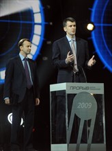 Moscow, russia, december 18, 2009, presidential aide arkady dvorkovich (l) looks on as chairman of the board of directors in polyus zoloto oao (ojsc polyus gold) and onexim group ceo mikhail prokhorov...