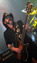 Moscow, russia, december 21, 2009, motorhead bassist lemmy kilmister performs at the luzhniki small sports arena during their tour of russia.