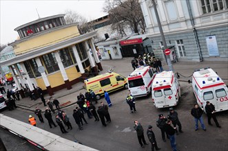 Moscow, russia, march 29, 2010, ambulances and police officers at an entrance to park kultury metro station, sokolnicheskaya line of the moscow underground, an explosion rocked the metro station at 8,...