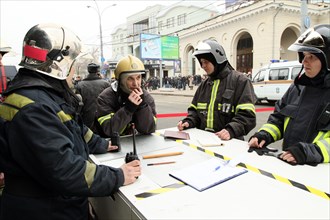 Moscow, russia, march 29, 2010, members of the russian emergencies ministry's mobile emergency response team outside park kultury metro station, sokolnicheskaya line of the moscow underground, an expl...