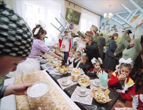 Ivanovo region, russia, june 7, 2004, llnmates of the local 3/3 women's colony and children from local orphanages pictured during a joint party as there is a practice that women prison inmates meet wi...