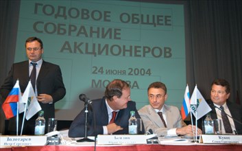 Moscow, russia, june 24, 2004, acting president of 'yukos rm' pyotr zolotarev, deputy head of yukos yuri beilin, head of nk yukos semen kukes, and head of 'yukos-moscow' steven theede (l-r), at the an...