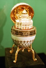 Moscow, russia, november 21, 2000, a model of the cathedral of christ the saviour encased in an easter egg jewellery piece