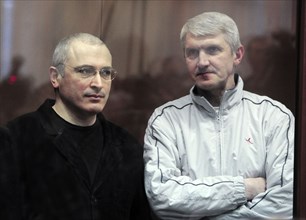Moscow, russia, december 27, 2010, former yukos chief mikhail khodorkovsky (l) and former menatep bank chief platon lebedev appear at the khamovniki district court, the court is expected to issue its ...