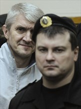 Moscow, russia, december 30, 2010, former menatep bank chief platon lebedev (background) appears in the khamovniki district court, lebedev and ex-yukos chief mikhail khodorkovsky were found guilty of ...