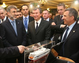 Kazan, russia, march 4, 2011, turkish energy minister taner yildiz, russian vice-prime minister igor sechin, and the head of tatarstan's regional government, rustam minnikhanov, (l-r front) view a dis...