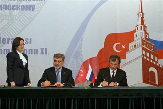 Kazan, russia, march 4, 2011, turkish energy minister taner yildiz and russian vice-prime minister igor sechin (l-r seated) during the signing ceremony at the 11th meeting of the russian-turkish inter...