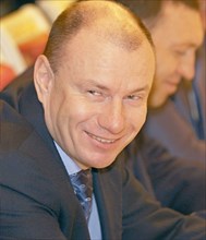 Moscow, russia, march 24, 2005, president of interros holding vladimir potanin smiles during a meeting held by russian president vladimir putin with representatives of the russian union of industriali...