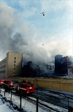 The fire in the building of moscow tire plant that broke out in the store-room of rubber is almost put out, eight water tanks, two hydrolic lifts and 15 air-pumps continue to work on the site,a helico...