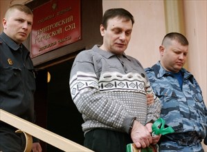 Moscow region, russia, april 15, 2005, former federal security service (fsb) officer mikhail trepashkin (c) leaves the building of the dmitrovsky district court, where he was sentenced to five years' ...