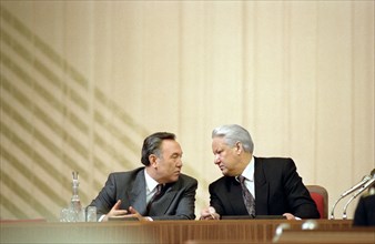 Russia, moscow, president of russia boris yeltsin (r) and president of kazakhstan nursultan nazarbaev are pictured in the presidium of the meeting, january 17, 1992.