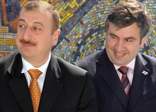 Azerbaijan, may 25, 2005, azerbaijani president ilham aliev (l) and georgian president mikhail saakashvili attend an inauguration ceremony of the azerbaijani section of the baku-tbilisi-ceyhan interna...