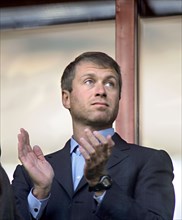 Chukotka's governor roman abramovich watches qualifying match of the 2006 soccer world championship, russia vs portugal from a grandstand, the game ended in a draw, 0-0, moscow, russia, september 8, 2...