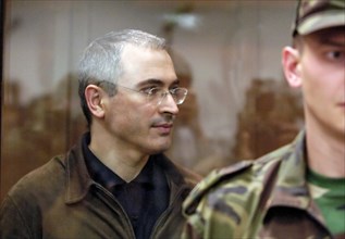 Moscow, russia, september 22, former head of yukos mikhail khodorkovsky leaves the courtroom after hearing that the moscow city court has reduced his and p, lebedev's sentences from 9 to 8 years of im...