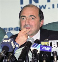 Moscow, russia, september 7, oil-to-media tycoon boris berezovsky pictured holding his chin at a press conference he gave here on thursday, berezovsky announced the names of the persons, journalists a...