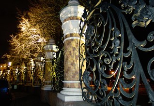 St,petersburg, russia, december 01, 2005, the graceful and impressive wrought-iron fence surrounding mikhailovsky garden gets a new architectural lighting designed by italian piero castiglioni as well...
