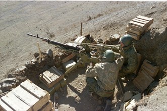 A machinegun emplacement of the itum-kale russian borderguards detachment stationed in the south of argun ravine in chechnya where the antiterrorist operation is in full swing now, the russian borderg...