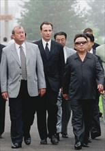 Moscow, russia, july 27, 2001, north korean leader kim chong il (r) and presidential envoy in the far eastern federal district konstantin pulikovsky (l) who met the guest at his arrival in the khasan ...