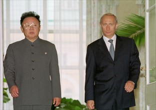 Moscow, russia, august 4, 2001, president vladimir putin, right, and north korean leader kim jong-il pictured after the talks held in an extended format in the kremlin here on saturday.
